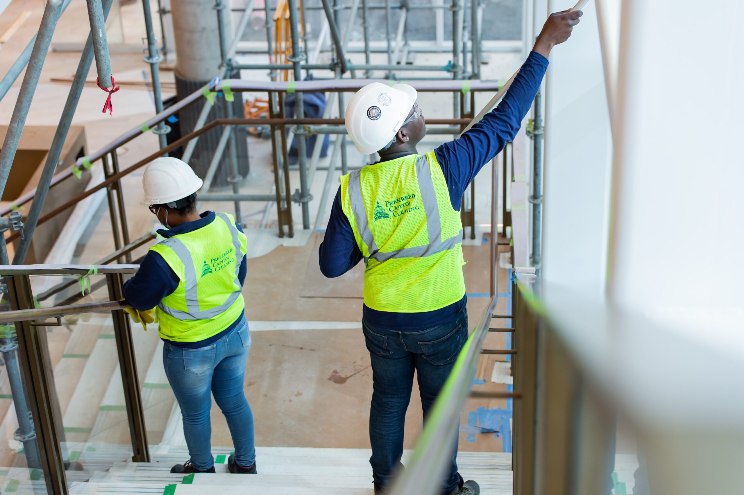 Cleaning crew with safety gear